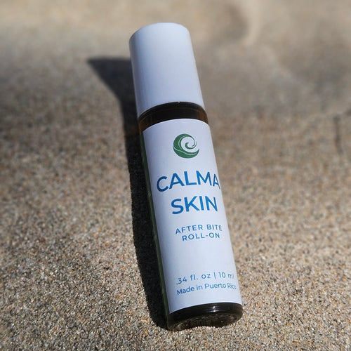 Calma skin product on the sand